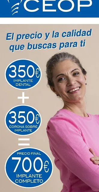 Mujer madura feliz por el precio y calidad de su implante dental